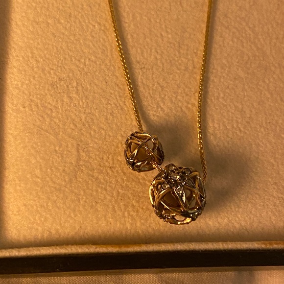 H. Stern Copernicus pendant. 18k gold & diamonds.